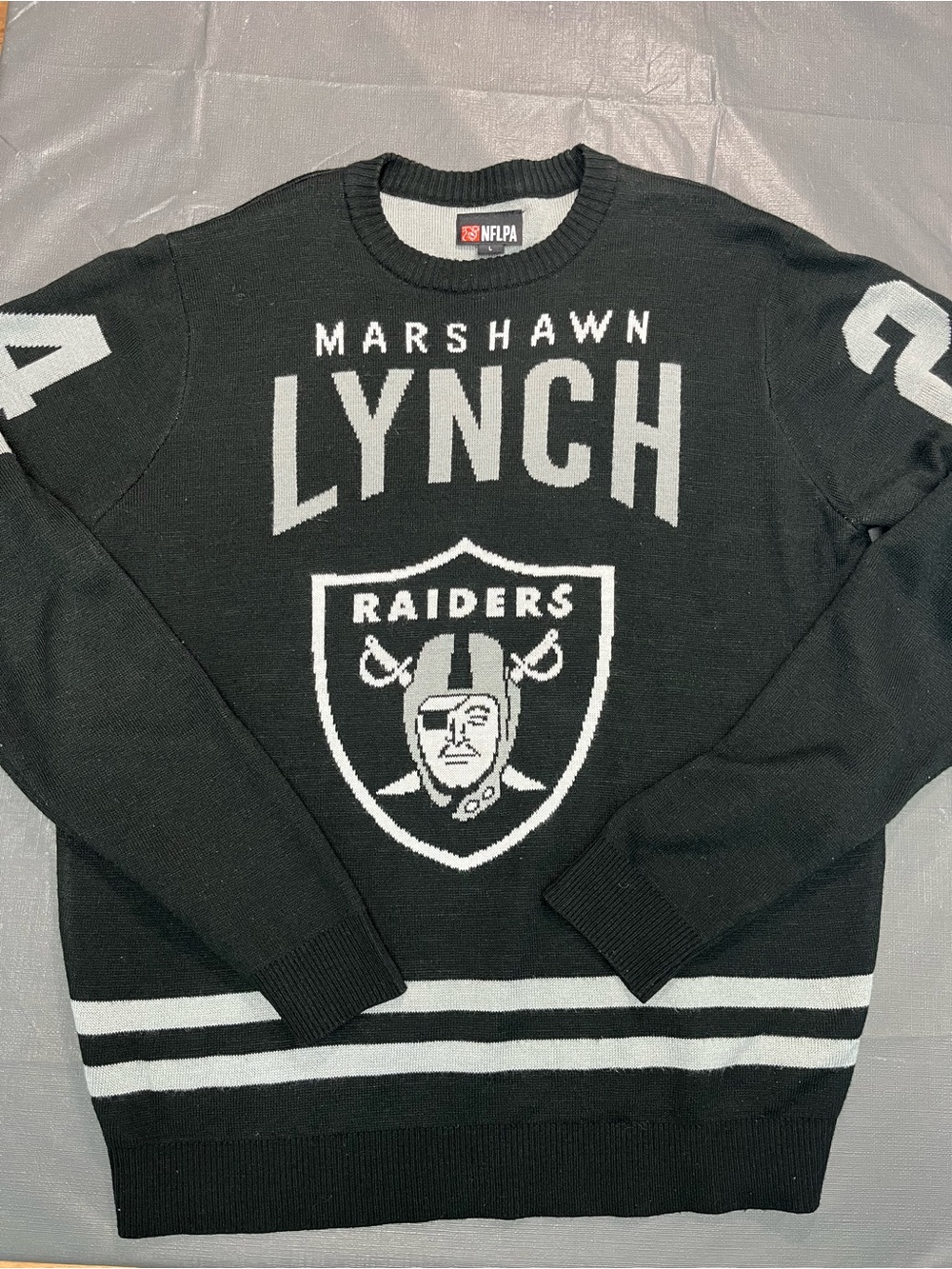NFLPA Marshawn Lynch Oakland Raiders Knit Sweater Size L Black & White